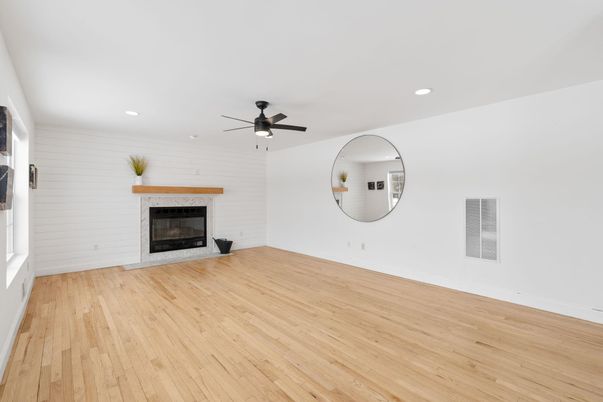 Empty room, Fireplace, Interior, Recessed Lighting, Wood Texture Flooring