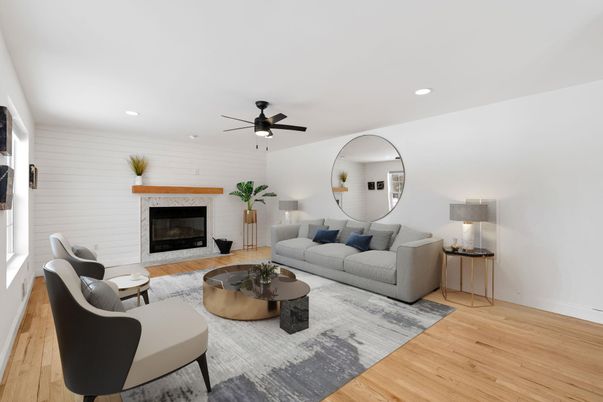 Fireplace, Interior, Living room, Recessed Lighting, Stone Walls, Wood Texture Flooring