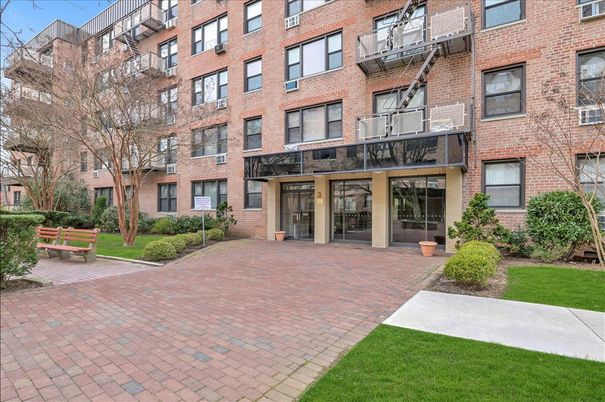 Exterior, Facade, Brick Facade, Condo Building