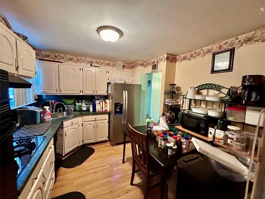 Dining room, Interior, Kitchen, Tile Countertops, Wood Texture Flooring