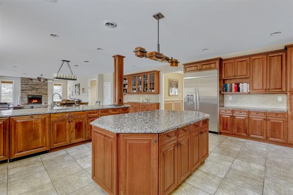 Fireplace, Interior, Kitchen, Pendant Lights, Recessed Lighting, Stainless Steel Appliances