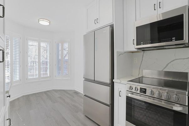 Interior, Kitchen, Marble Walls, Stainless Steel Appliances, Wood Texture Flooring