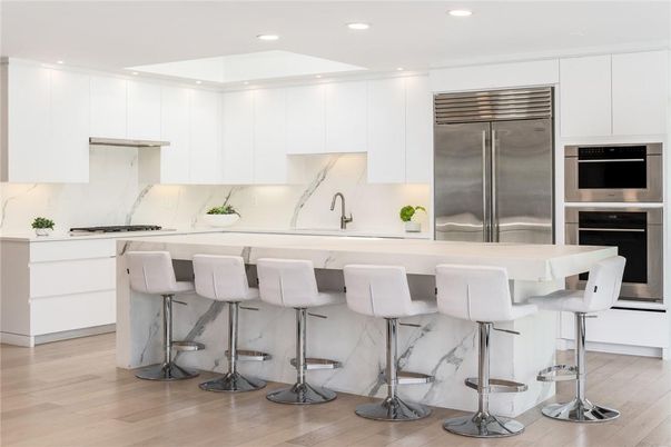Interior, Kitchen, Marble Walls, Recessed Lighting, Stainless Steel Appliances, Wood Texture Flooring