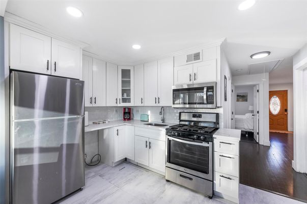 Interior, Kitchen, Recessed Lighting, Stainless Steel Appliances, Wood Texture Flooring