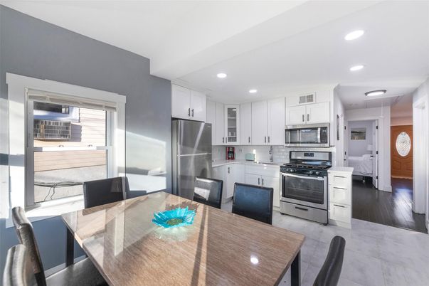 Dining room, Interior, Kitchen, Recessed Lighting, Stainless Steel Appliances, Wood Texture Flooring
