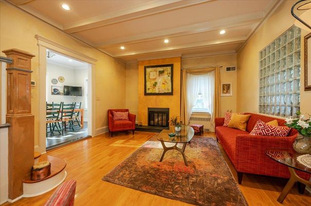 Dining room, Fireplace, Interior, Living room, Recessed Lighting, Wood Texture Flooring