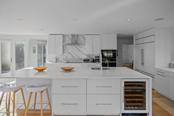 Interior, Kitchen, Marble Walls, Recessed Lighting, Stainless Steel Appliances, Wood Texture Flooring