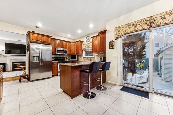 Fireplace, Interior, Kitchen, Recessed Lighting, Stainless Steel Appliances