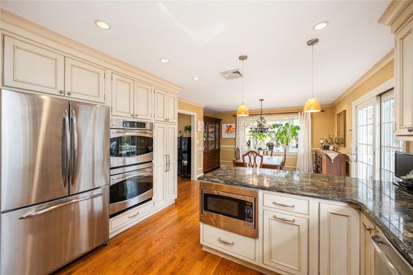 Interior, Kitchen, Pendant Lights, Recessed Lighting, Stainless Steel Appliances, Wood Texture Flooring