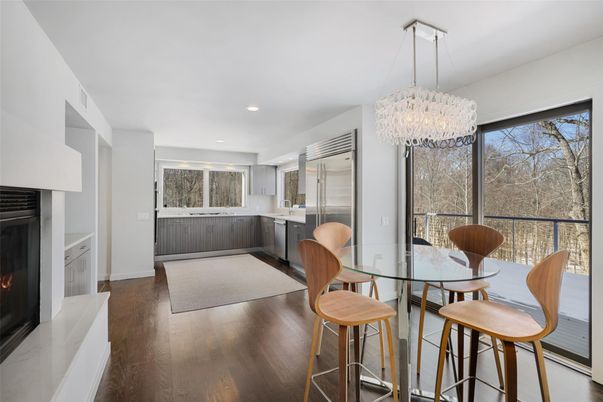 Chandelier, Dining room, Fireplace, Interior, Kitchen, Recessed Lighting, Wood Texture Flooring