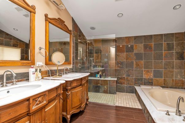 Bathroom, Dual Sink Vanities, Glass Shower, Interior, Recessed Lighting, Wood Texture Flooring