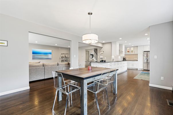 Dining room, Interior, Kitchen, Living room, Pendant Lights, Recessed Lighting, Stainless Steel Appliances, Wood Texture Flooring