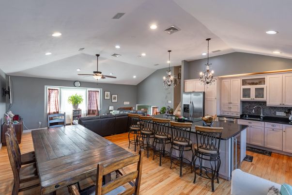 Chandelier, Dining room, Interior, Kitchen, Living room, Recessed Lighting, Stainless Steel Appliances, Wood Texture Flooring
