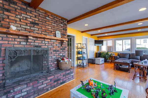 Fireplace, Interior, Living room, Recessed Lighting, Stone Walls, Wooden Beams, Wood Texture Flooring