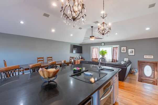 Chandelier, Dining room, Interior, Kitchen, Living room, Recessed Lighting, Wood Texture Flooring