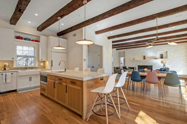 Dining room, Fireplace, Interior, Kitchen, Pendant Lights, Recessed Lighting, Stainless Steel Appliances, Stone Walls, Wooden Beams, Wood Texture Flooring