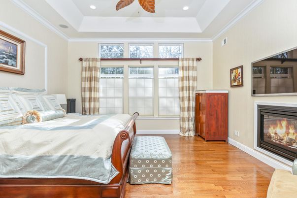 Bedroom, Fireplace, Interior, Recessed Lighting, Wood Texture Flooring