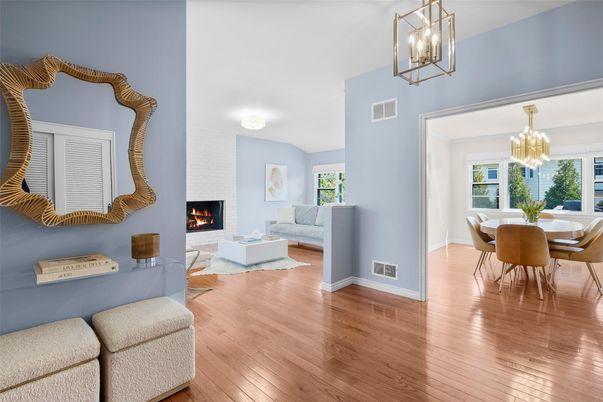 Chandelier, Dining room, Fireplace, Interior, Living room, Pendant Lights, Wood Texture Flooring