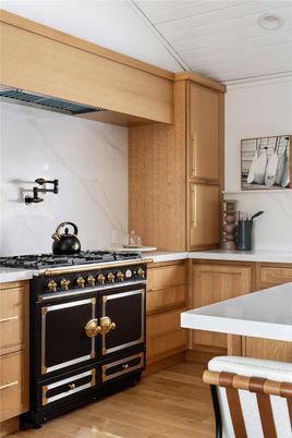 Interior, Kitchen, Marble Walls, Stainless Steel Appliances, Wood Texture Flooring