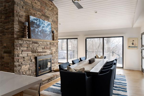 Dining room, Fireplace, Interior, Stone Walls, Wood Texture Flooring