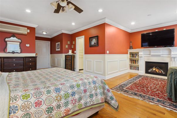 Bedroom, Fireplace, Interior, Recessed Lighting, Wood Texture Flooring