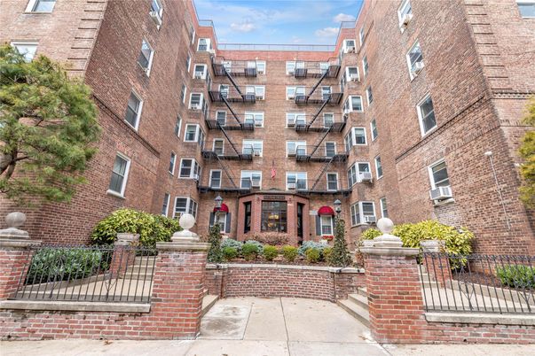 Exterior, Facade, Brick Facade, Condo Building