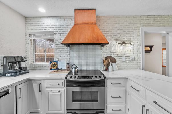 Interior, Kitchen, Recessed Lighting, Stainless Steel Appliances, Stone Walls