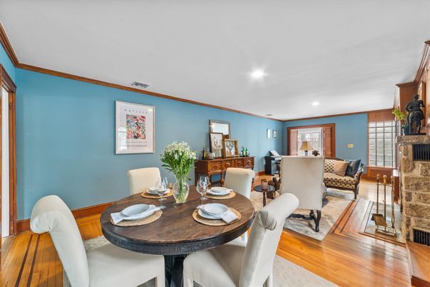 Dining room, Fireplace, Interior, Living room, Recessed Lighting, Wood Texture Flooring