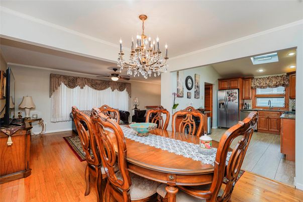 Chandelier, Dining room, Interior, Kitchen, Recessed Lighting, Stainless Steel Appliances, Wood Texture Flooring
