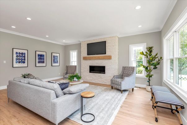 Fireplace, Interior, Living room, Recessed Lighting, Stone Walls, Wood Texture Flooring