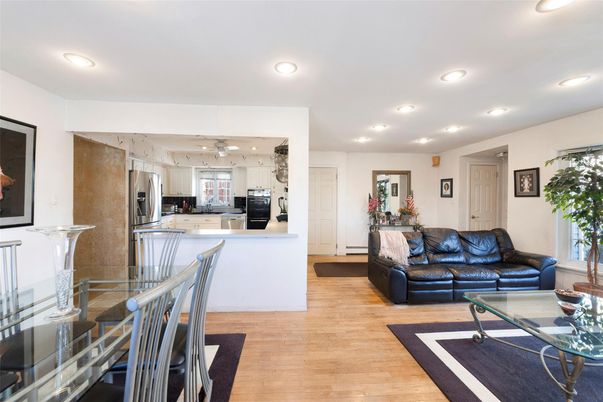Dining room, Interior, Kitchen, Living room, Recessed Lighting, Stainless Steel Appliances, Wood Texture Flooring