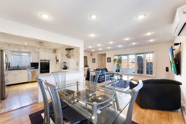 Dining room, Interior, Kitchen, Recessed Lighting, Stainless Steel Appliances, Wood Texture Flooring