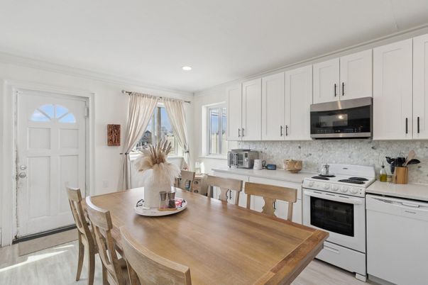 Dining room, Interior, Kitchen, Recessed Lighting, Stainless Steel Appliances, Wood Texture Flooring