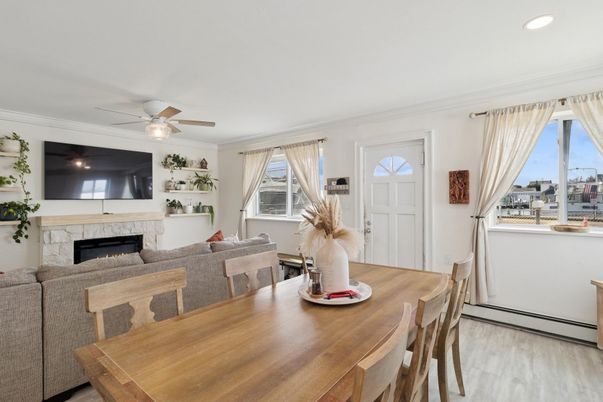 Dining room, Fireplace, Interior, Living room, Recessed Lighting, Wood Texture Flooring