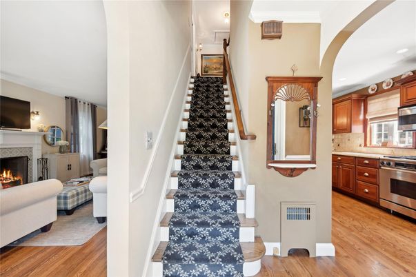 Fireplace, Interior, Kitchen, Recessed Lighting, Stainless Steel Appliances, Wood Texture Flooring