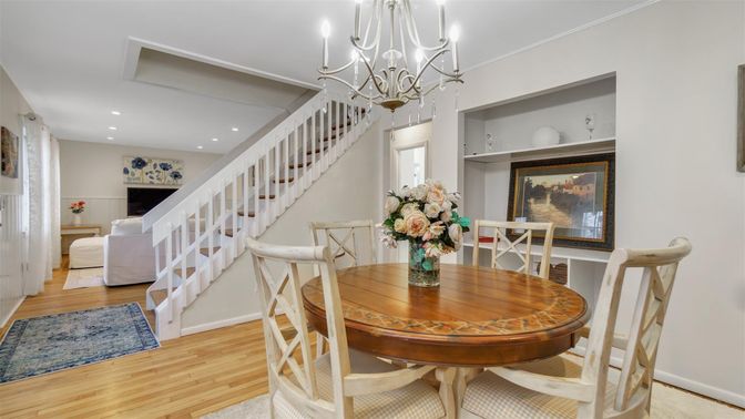 Chandelier, Dining room, Fireplace, Interior, Living room, Recessed Lighting, Wood Texture Flooring