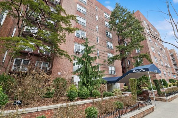 Exterior, Facade, Brick Facade, Condo Building