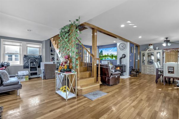 Dining room, Fireplace, Interior, Living room, Recessed Lighting, Stone Walls, Wooden Beams, Wood Texture Flooring