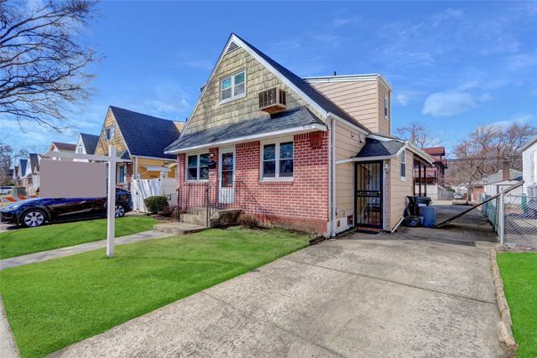 Exterior, Facade, Brick Facade, Cape Cod