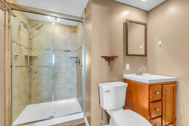 Bathroom, Glass Shower, Interior, Recessed Lighting, Wood Texture Flooring