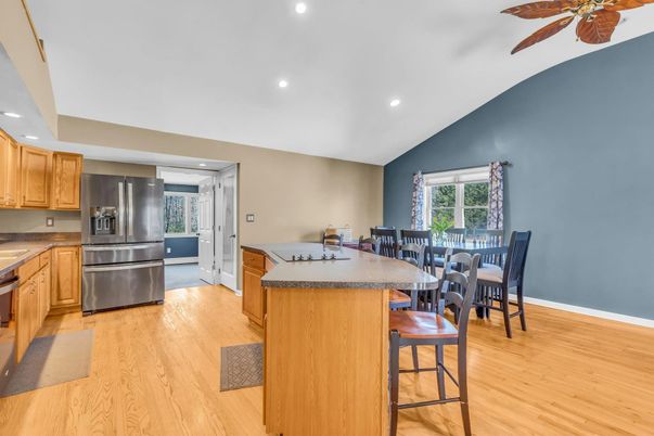 Dining room, Interior, Kitchen, Recessed Lighting, Stainless Steel Appliances, Wood Texture Flooring
