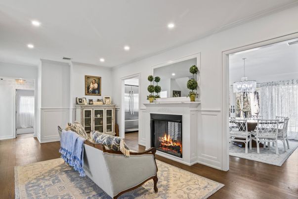 Chandelier, Dining room, Fireplace, Interior, Living room, Recessed Lighting, Wood Texture Flooring