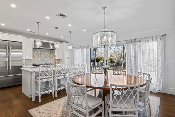Chandelier, Dining room, Interior, Kitchen, Pendant Lights, Recessed Lighting, Stainless Steel Appliances, Wood Texture Flooring