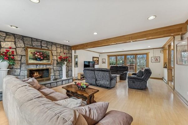 Fireplace, Interior, Living room, Recessed Lighting, Stone Walls, Wooden Beams, Wood Texture Flooring