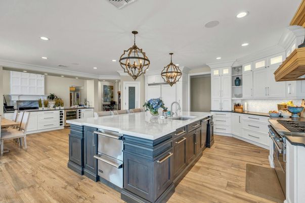 Chandelier, Dining room, Interior, Kitchen, Pendant Lights, Recessed Lighting, Stainless Steel Appliances, Wood Texture Flooring