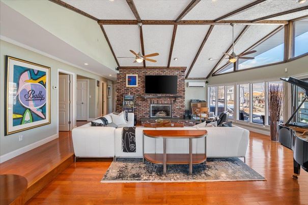 Fireplace, Interior, Living room, Recessed Lighting, Stone Walls, Wooden Beams, Wood Texture Flooring