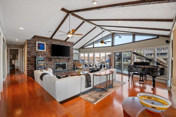Fireplace, Interior, Living room, Piano, Recessed Lighting, Stone Walls, Wooden Beams, Wood Texture Flooring