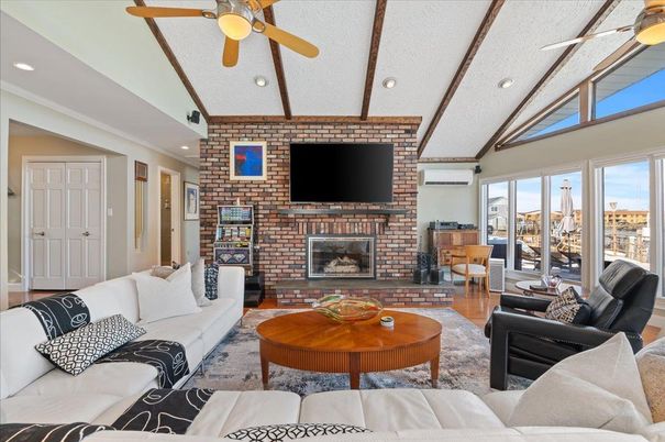 Fireplace, Interior, Living room, Recessed Lighting, Stone Walls, Wooden Beams, Wood Texture Flooring