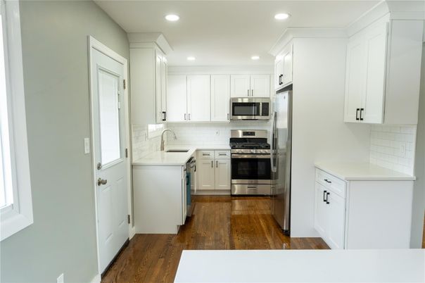 Interior, Kitchen, Recessed Lighting, Stainless Steel Appliances, Wood Texture Flooring