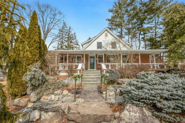 Exterior, Facade, Brick Facade, Log Home